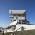 Harmonious Architectural Continuity: Exelmans Michel-Ange Building by Stefan Architecture